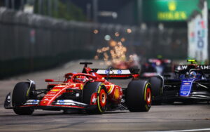SINGAPORE, SINGAPORE - SEPTEMBER 22: Charles Leclerc of Monaco driving the (16) Ferrari SF-24 leads Franco Colapinto of Argentina driving the (45) Williams FW45 Mercedes on track during the F1 Grand Prix of Singapore at Marina Bay Street Circuit on September 22, 2024 in Singapore, Singapore. (Photo by Clive Rose - Formula 1/Formula 1 via Getty Images)